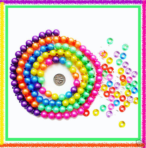 Feet of Exquisite Pearl Pop Beads and 100 Jelly spacer rings AND